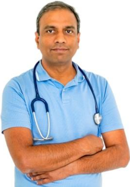 Michael Brian holding a kitten. Veterinarian holding a kitten